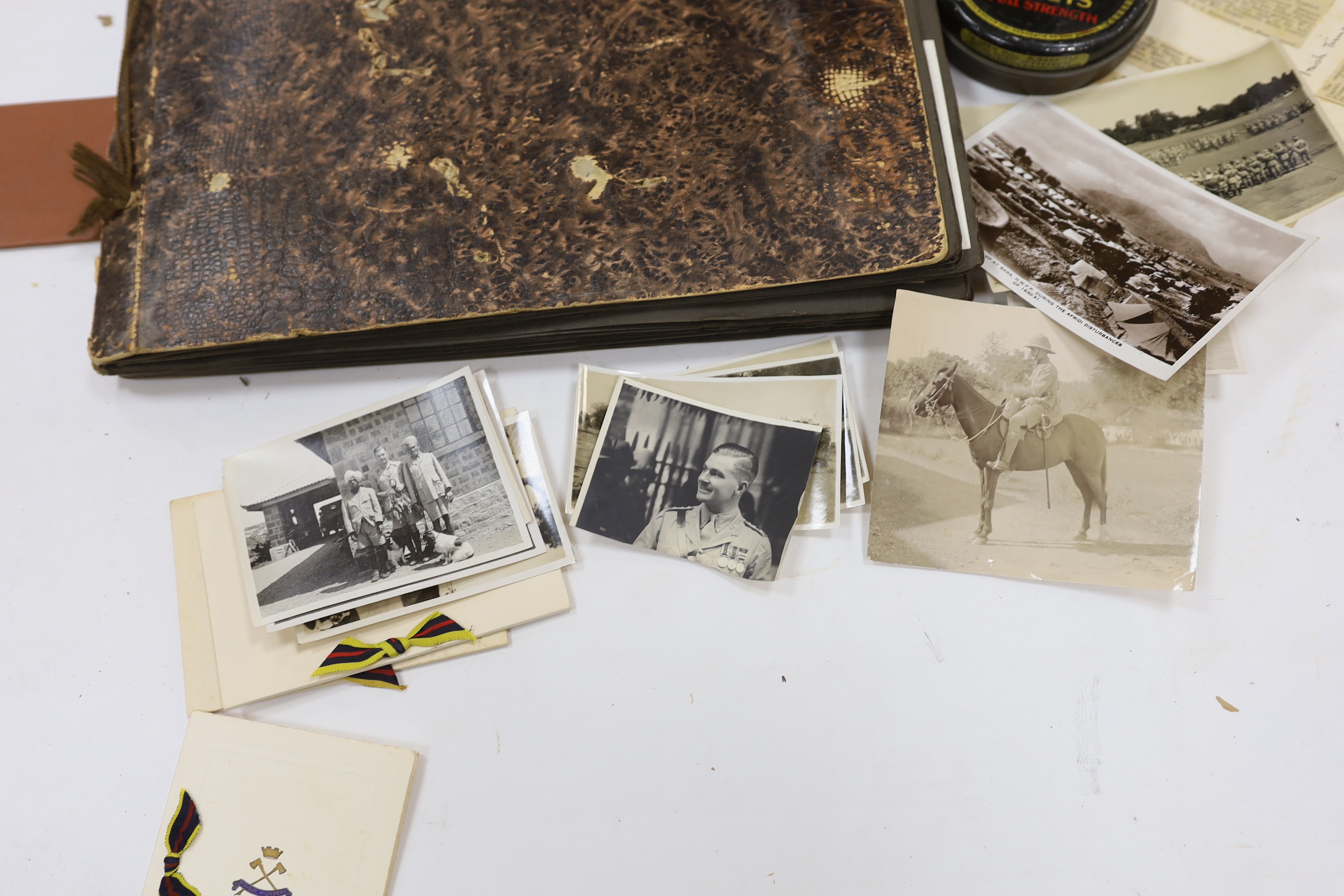 A 1930s archive of photos, invitations, postcards, etc. relating to Indian military regiments including; the 8th Punjab Reg., the 1st Bombay Grenadiers, the 2nd Sikhs, the Royal Indian Navy, Army Headquarters India, etc,